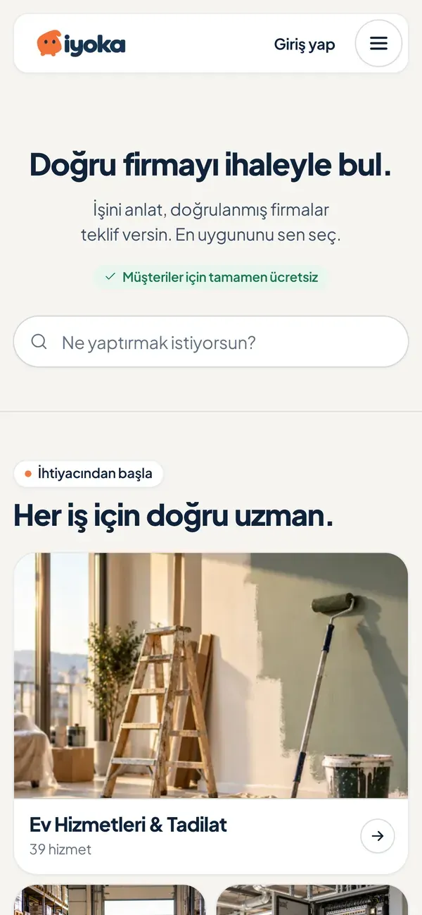 The İyoka home page on a phone. The headline "Find the right company with a tender." and a search box.